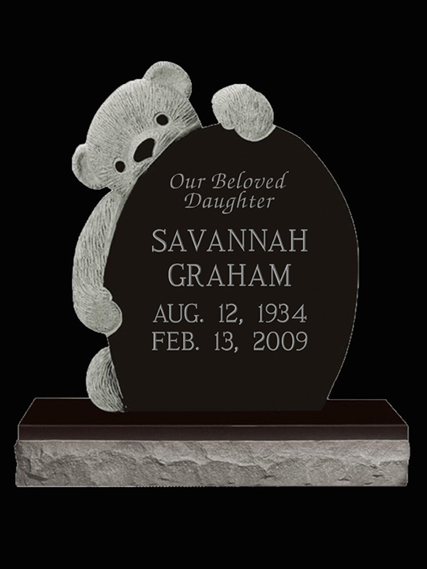 Monument-Graham custom granite monuemtn with bear statue.