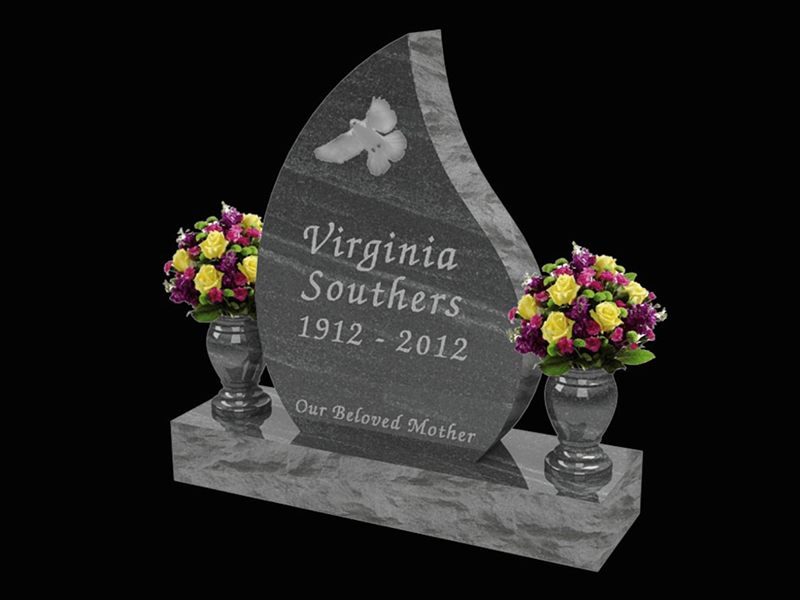 Monument-Southers custom monument with an etched design of a dove.