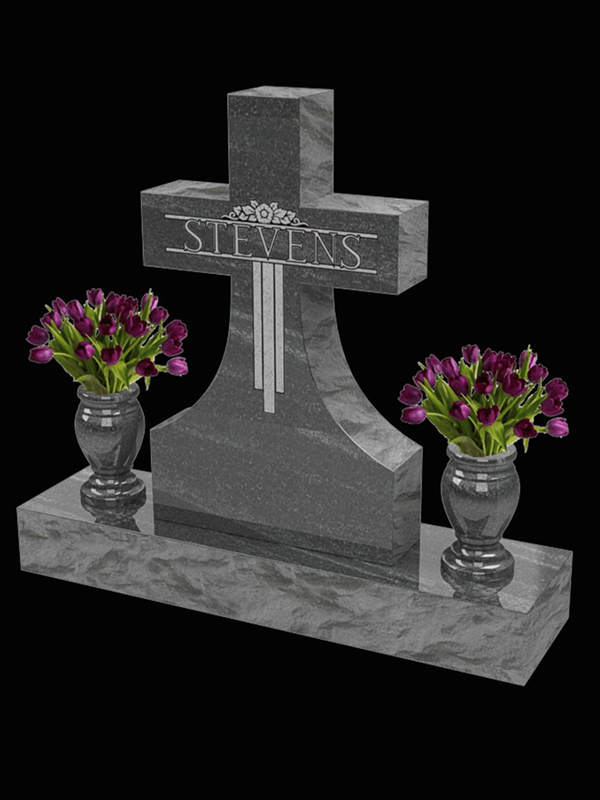 Monument-Stevens Custom monument of a cross with flowers on each side.