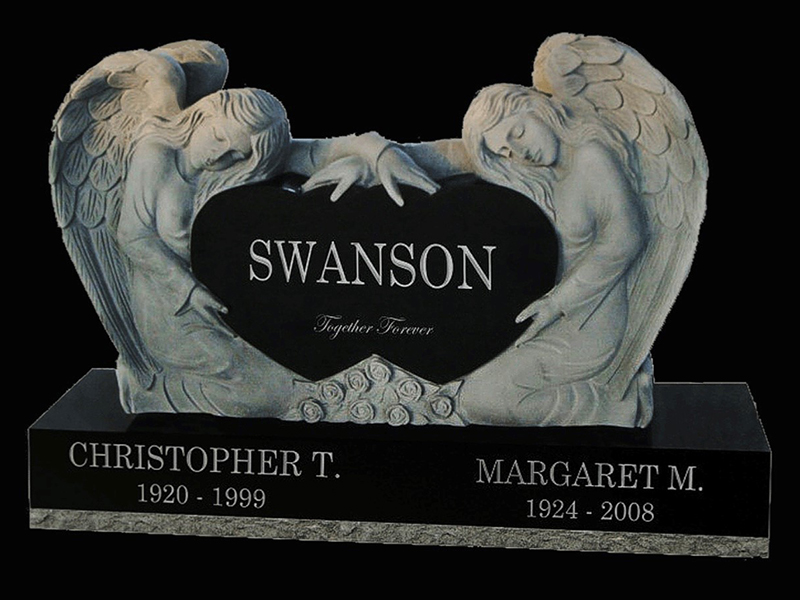 Monument-Swanson Custom monument with black granite and two angels.