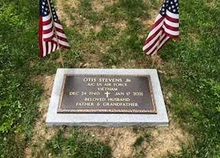 DC Bronze Marker - Stevens bronze memorial with with american flags